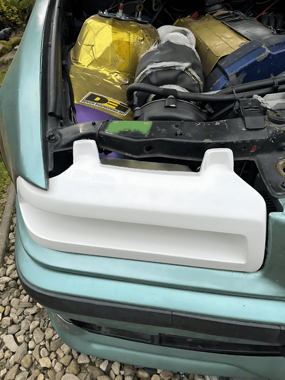 BMW 3 Series E36 headlight duct by K2 Industries, featuring the distinctive "The Eye" design, for models 1990-1999.