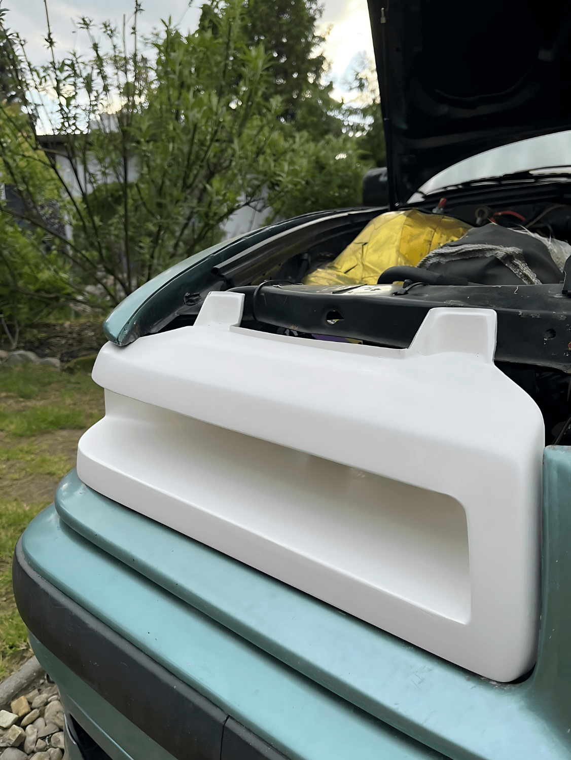 BMW 3 Series E36 "The Eye" headlight duct by K2 Industries, designed for 1990-1999 models, showcasing the headlight intake area.