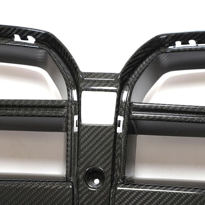 Carbon fiber kidney grille for BMW G80 M3 and G82 G83 M4 by Palenon Performance, showcasing sleek, lightweight design.