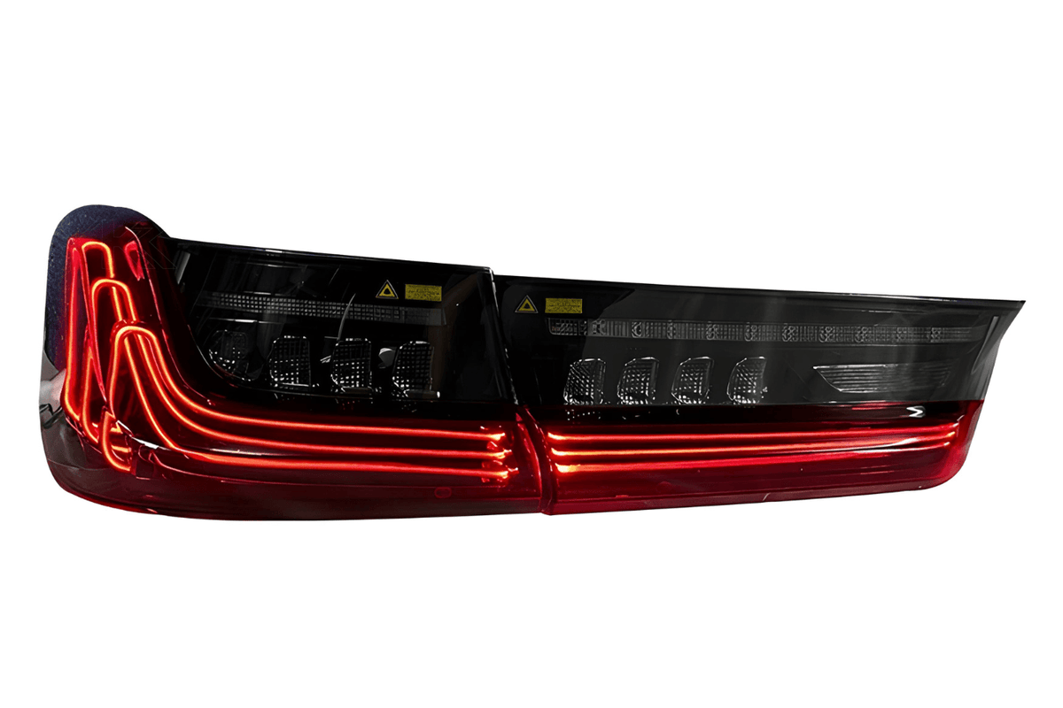 BMW 3 Series G20 G28 tail lights by K2 Industries, red and smoked CSL style laser tail lights installed on 2019-2024 model.