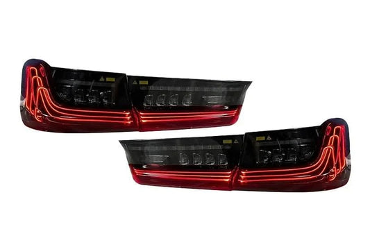 BMW 3 Series G20 G28 tail lights with red and smoked CSL style laser design by K2 Industries, rear view of the car's taillights.
