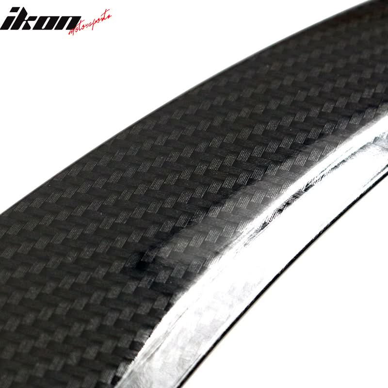 BMW F26 X4 trunk spoiler with carbon fiber print by K2 Industries, showing a sleek, aerodynamic design on the vehicle's rear.