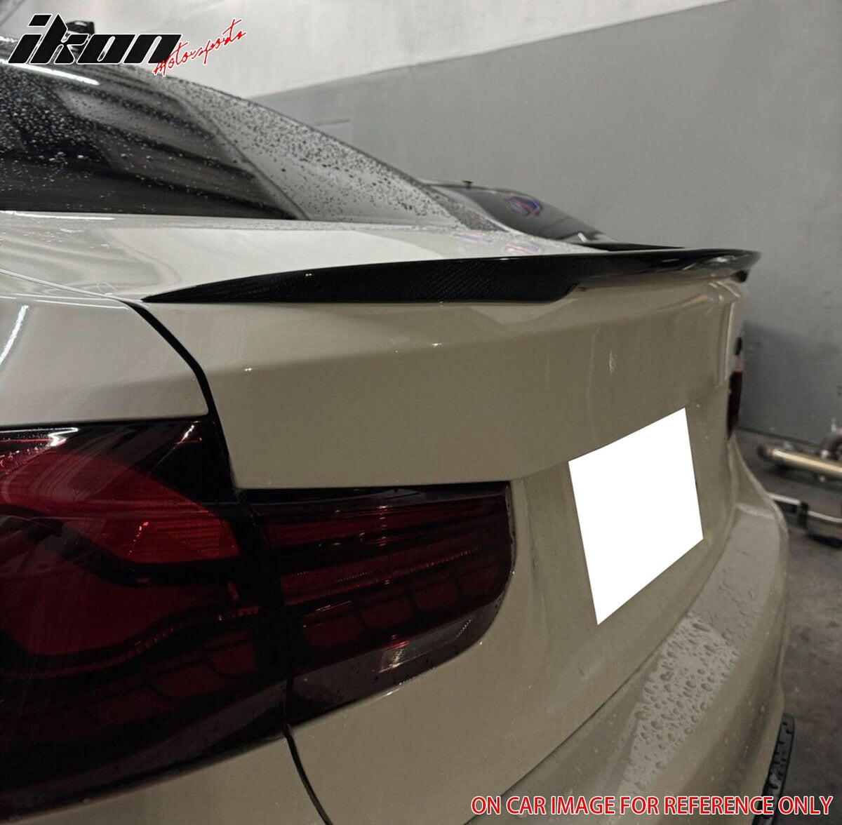 Carbon fiber trunk spoiler for BMW F30 F80 M3 sedan, designed by K2 Industries, with a sleek, aerodynamic look.