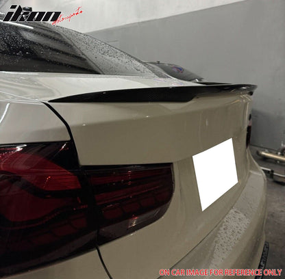 Carbon fiber trunk spoiler for BMW F30 F80 M3 sedan, designed by K2 Industries, with a sleek, aerodynamic look.