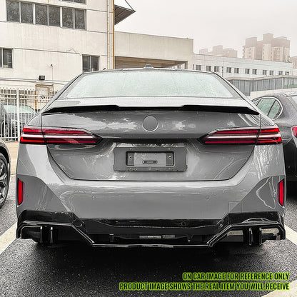 BMW G60 5-Series i5 M5 V Style trunk spoiler in carbon fiber print on black ABS, designed for BMW G60 5-Series models.