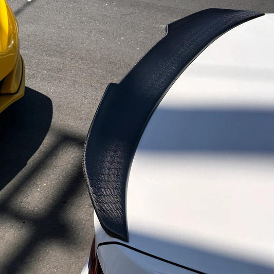 HoneyComb Carbon BMW F22 M2 trunk spoiler by Palenon Performance, showcasing a sleek, aerodynamic design on a coupe.