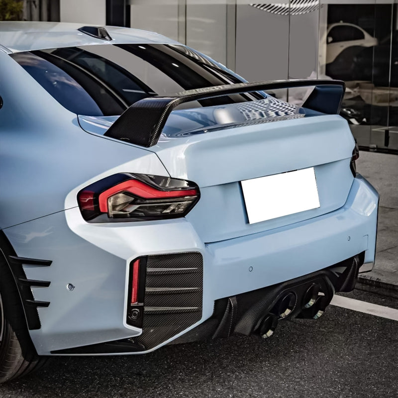 BMW G87 M2 rear side fins diffuser in M Performance style by K2 Industries, showing sleek black design with textured details.