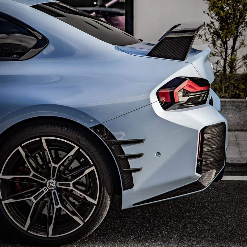 BMW G87 M2 rear side fins diffuser in M Performance style by K2 Industries, showcasing sleek black aerodynamic design.