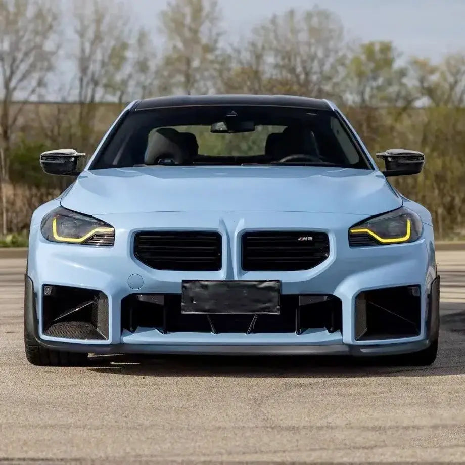 Carbon fiber M Style front lip for BMW M2 G87 by Palenon Performance, gloss black, three-piece sporty front spoiler.