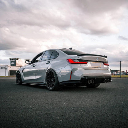 BMW G20 G80 M3 CS style carbon fiber trunk spoiler by Palenon Performance, showing sleek aerodynamic design on a black car.
