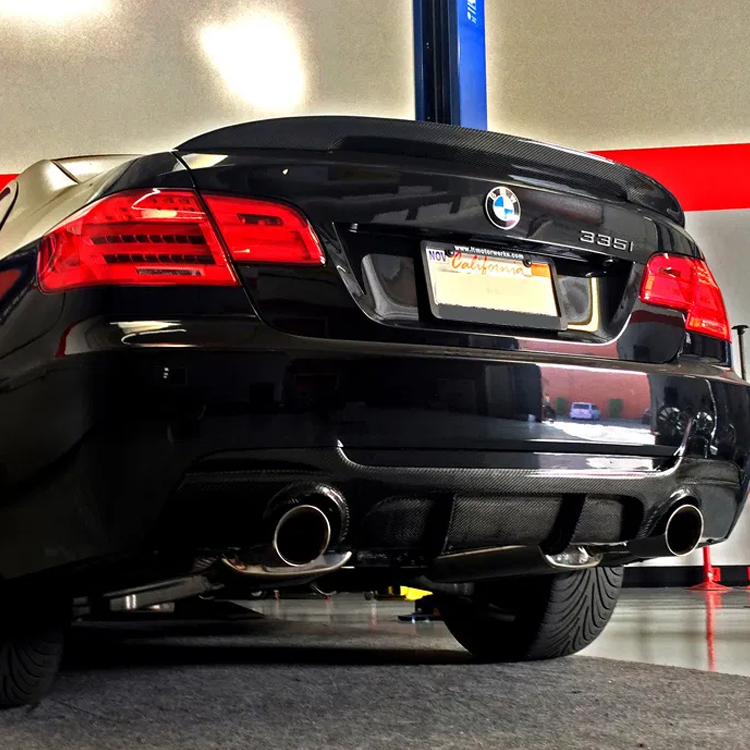 BMW E92 328i/335i M Tech carbon fiber rear diffuser by Palenon Performance, showing sleek aerodynamic design for sporty look.