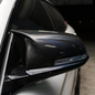 Carbon fiber M style mirror caps for BMW F48 X1 and Palenon Performance CF mirror covers on a BMW F48 vehicle.