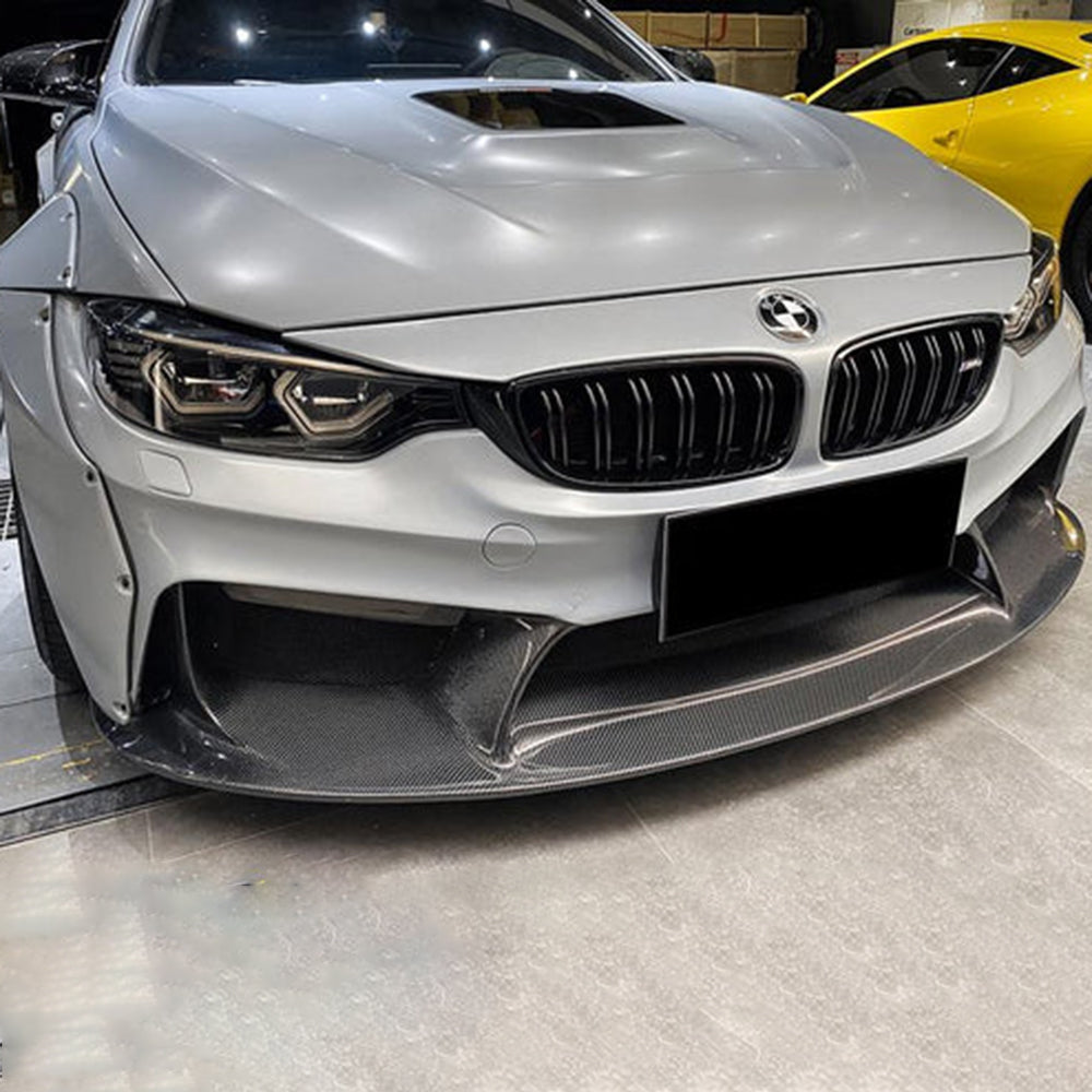 Carbon fiber grille for BMW F80 M3 and F82 M4 from Palenon Performance, showcasing the sleek, textured CF design on the front of the vehicle.