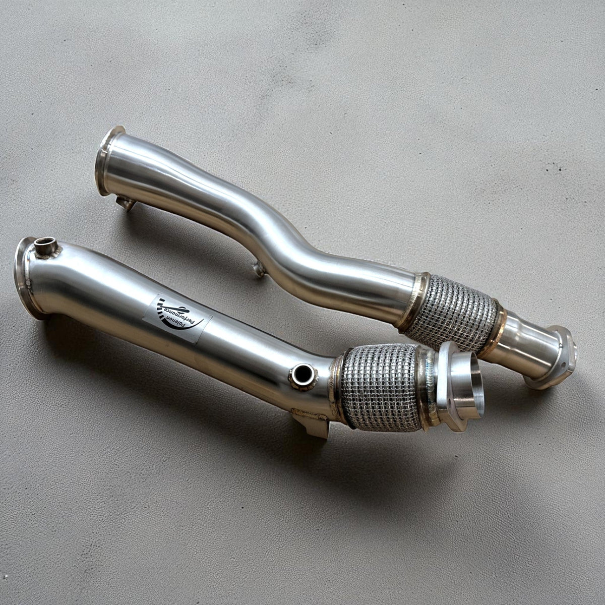 Palenon Performance 700HP upgrade kit for BMW S58 F97 X3M and F98 X4M, including downpipe and performance components