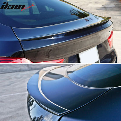 BMW F26 X4 trunk spoiler with carbon fiber print by K2 Industries, showcasing sleek aerodynamic design and textured finish.
