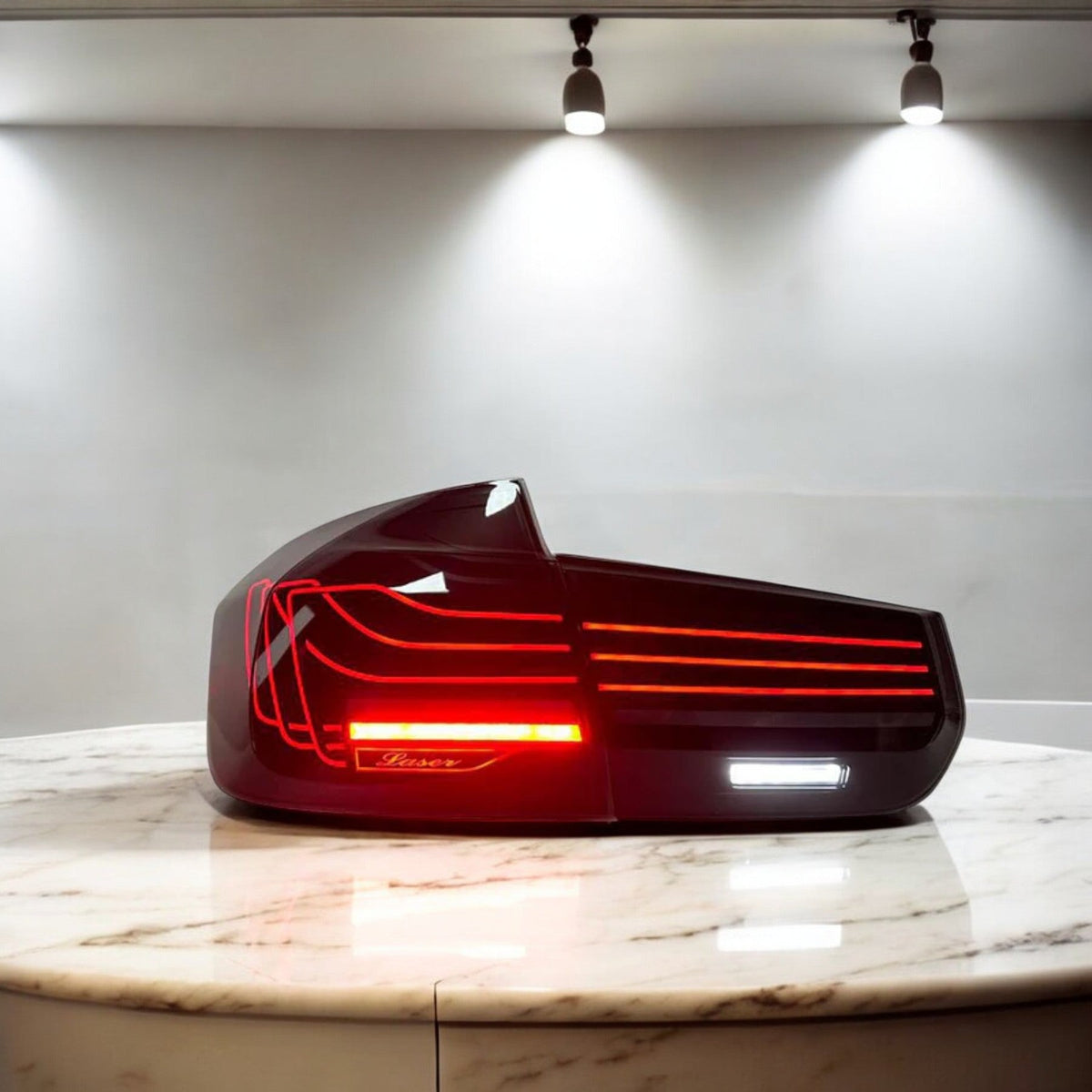 BMW F30 and M3 F80 CSL laser tail lights, aftermarket Bmw tail light by Palenon Performance, showcasing sleek red and clear lens design.