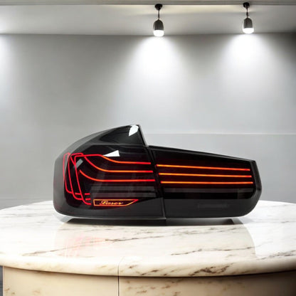 BMW F30 M3 F80 3 Series CSL laser tail lights by Palenon Performance showing sleek LED design with red and clear lenses