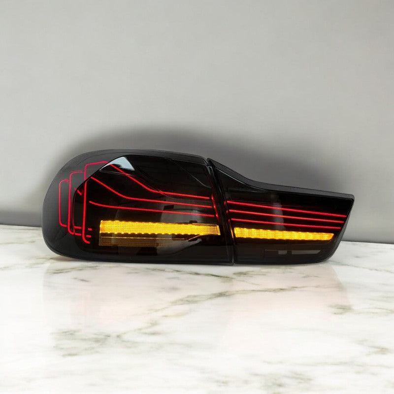 Palenon Performance CSL-style laser BMW F82 M4 and F32 4 Series tail lights with sleek design and LED illumination.