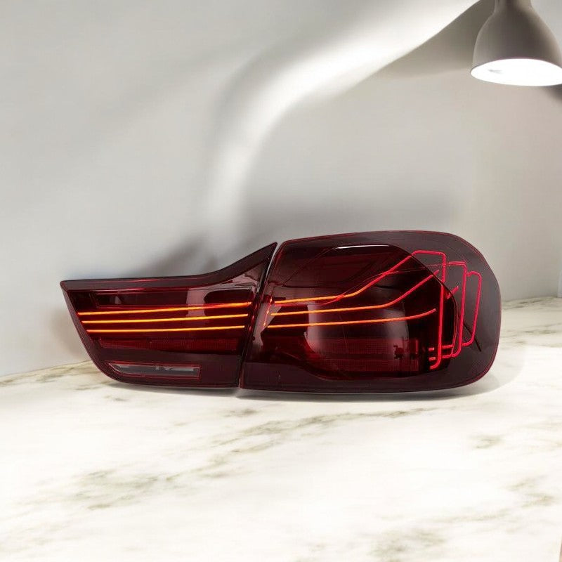 BMW F82 M4 and F32 4-Series CSL-style laser tail lights by Palenon Performance, featuring sleek design and LED lighting.