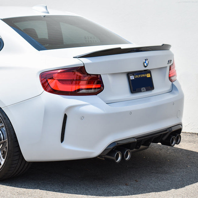 Carbon fiber BMW F87 M2 and F22 CS style trunk spoiler by Palenon Performance, showcasing sleek aerodynamic design.