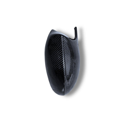 Carbon fiber M style mirror caps for BMW E9X M3 and E82 1M models, featuring sleek, textured finish on mirror covers.