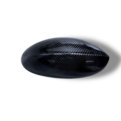 Carbon fiber M style mirror caps for BMW E9X M3 and E82 1M, pre-LCI 2007-2010, with a sleek, textured finish.