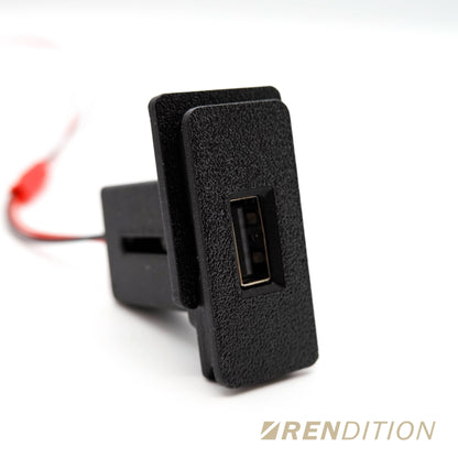 BMW E30 interior with K2 Industries front USB charging module installed in the dashboard area.