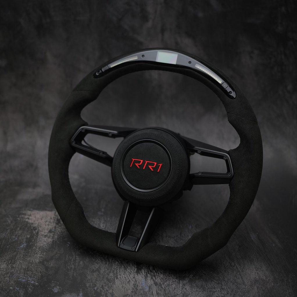 Custom Porsche 911 (992), Taycan, Macan steering wheel by Exclusive Steering, featuring premium leather and detailed stitching.