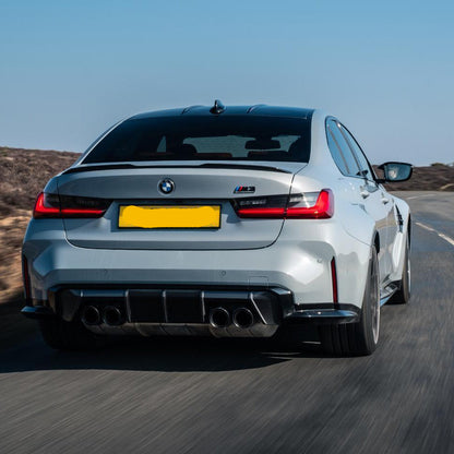BMW G80 M3 and G82 M4 carbon fiber rear canard splitter flaps by Palenon Performance, showing the aerodynamic design and finish.