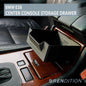 BMW E38 interior center console storage drawer by K2 Industries, showing the organized compartment and sleek interior design.