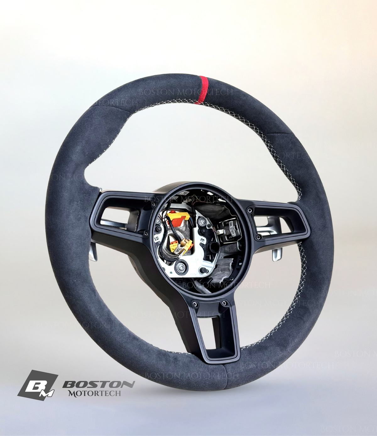 Red PDK Porsche 991.2 steering wheel by Boston Motortech, featuring sporty design and premium leather detailing.