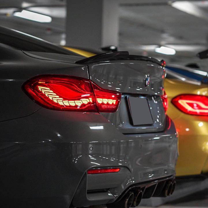 BMW M4 F82 GTS OLED sequential tail light by Palenon Performance, showing sleek illuminated LED design and modern tail light features.