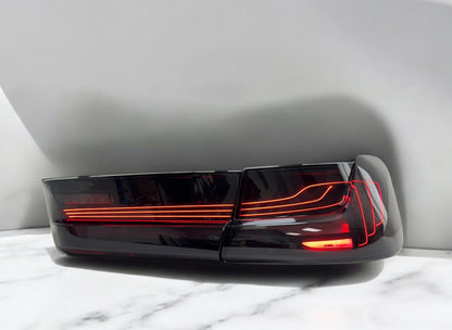 BMW G80 M3 laser smoked tail light by Palenon Performance, showcasing sleek design and advanced LED lighting.