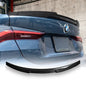 Carbon fiber V style trunk spoiler for BMW G82 M4 and G22 from Palenon Performance, showcasing sleek design and aerodynamic features.