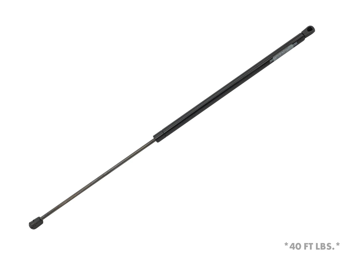 GoWesty Lift Assist Gas Strut for Bus and Vanagon, showing the sturdy gas lift component in a close-up view.