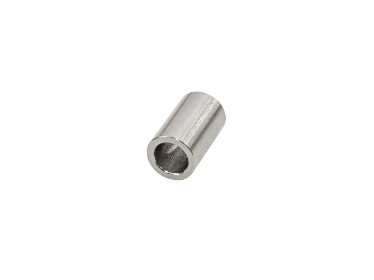 Stainless bushing sleeve for front shock from GoWesty bushing kit, shown in a close-up image.