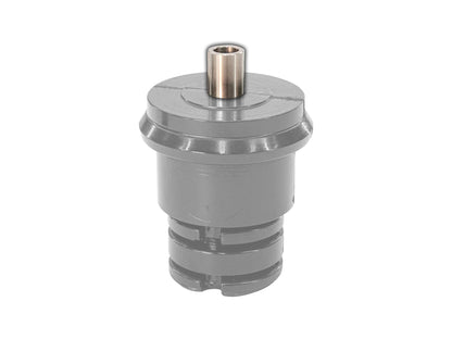 Stainless bushing sleeve for front shock in GoWesty bushing kit, shown installed on vehicle suspension.