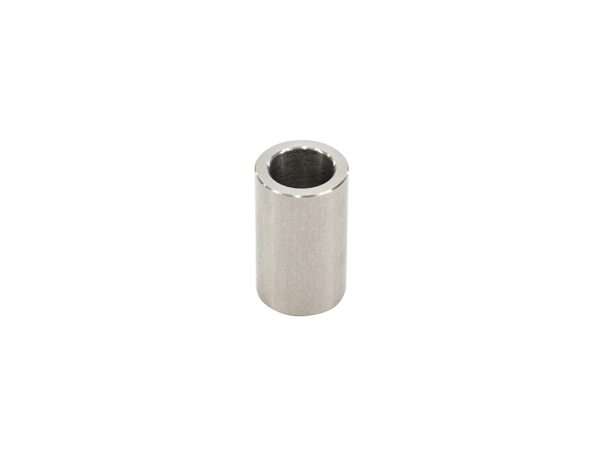 Stainless bushing sleeve for front shock from GoWesty Bushing Kits, shown in close-up view with metal components.