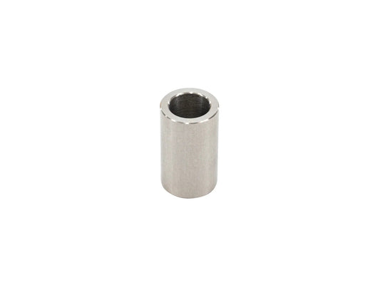 Stainless bushing sleeve for front shock from GoWesty Bushing Kits, shown in close-up view with metal components.