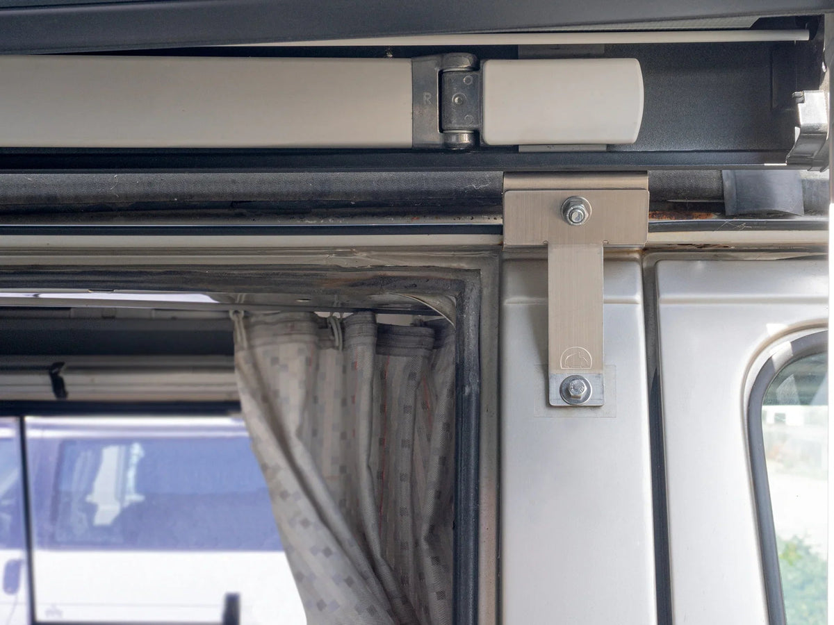 GoWesty awning or shower mounting kit installed inside a Bus or Vanagon, interior accessories for camper van conversion.