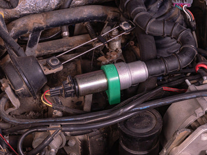 Installed GoWesty Mounting Grommet for Idle Air Control Valve on Late Vanagon, showing secure fit and positioning.