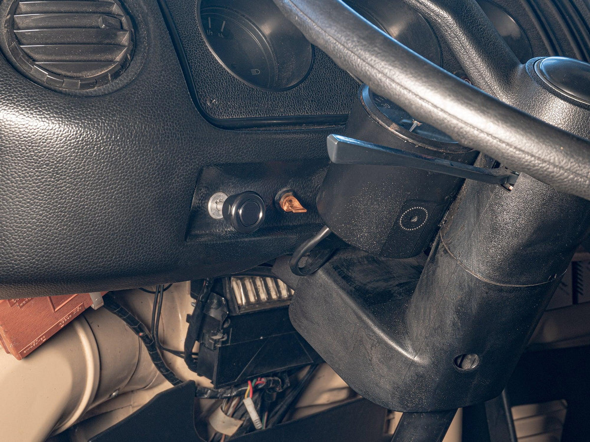 GoWesty OEM-style vacuum switch kit with black switch and wiring, designed for locker or decoupler systems in engine compartments.