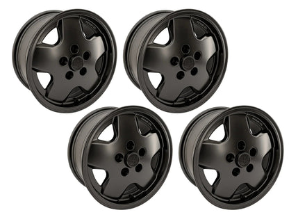 Set of four GoWesty OEM replica alloy wheels for Bus and Vanagon, available in 15", 16", and 17" sizes, black finish.