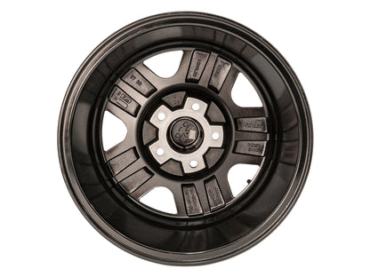 GoWesty OEM replica alloy wheel bundle for Bus/Vanagon, 15-inch black wheel with detailed back view.