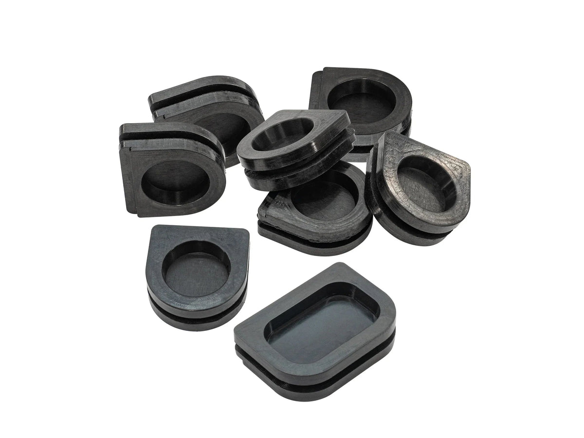 GoWesty Grommet Set for Junction & Relay Boxes, Vanagon electrical accessories with black rubber grommets stacked in packaging.