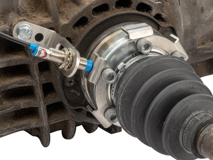 GoWesty vehicle speed sensor kit installed on axle, showing the sensor and wiring for accurate speed measurement.