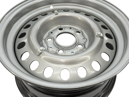 GoWesty steel wheel hubcap mounting kit installed on wheel, showing the secure attachment of the hubcap to the wheel.