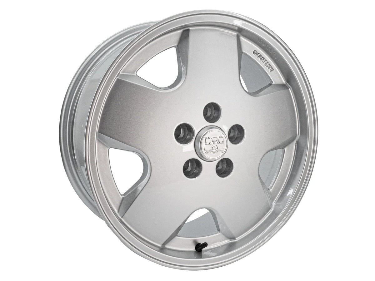 Angled view of GoWesty OEM Replica Alloy Wheel bundle for Bus/Vanagon, available in 15, 16, and 17-inch sizes.