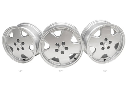 Set of GoWesty OEM replica alloy wheels in 15, 16, and 17-inch sizes for Bus and Vanagon models, featuring stylish wheel designs.