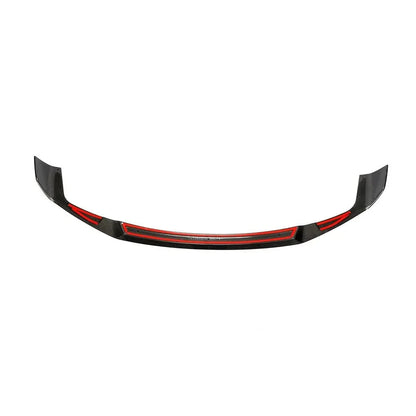 Gloss carbon fiber front splitter lip for BMW M2 Competition F87, designed for aerodynamic enhancement and sporty appearance.